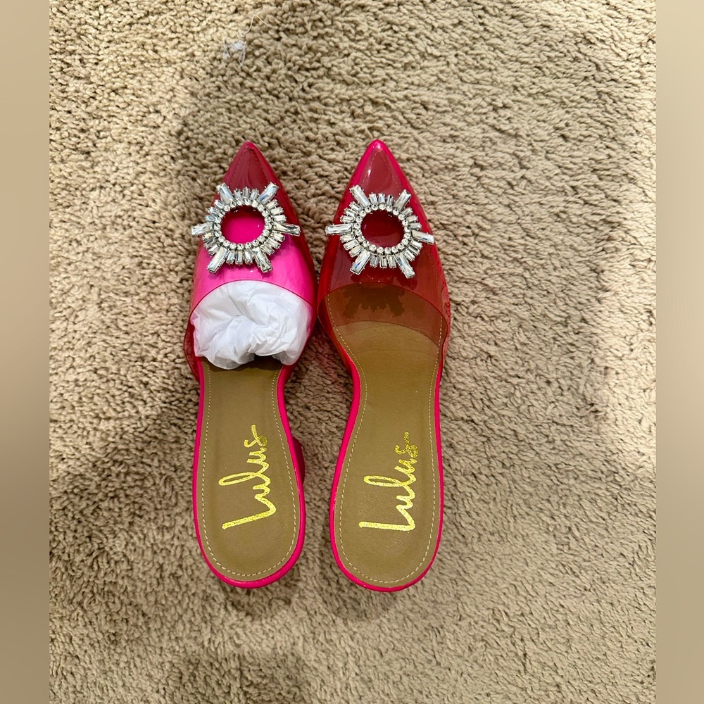 Pink shoes with a metallic ring